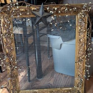 Decorative Gold Framed Mirror with Star Accent